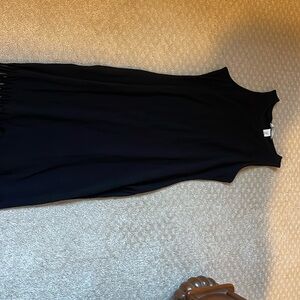 Black H & M bodycon dress with fringe bottom